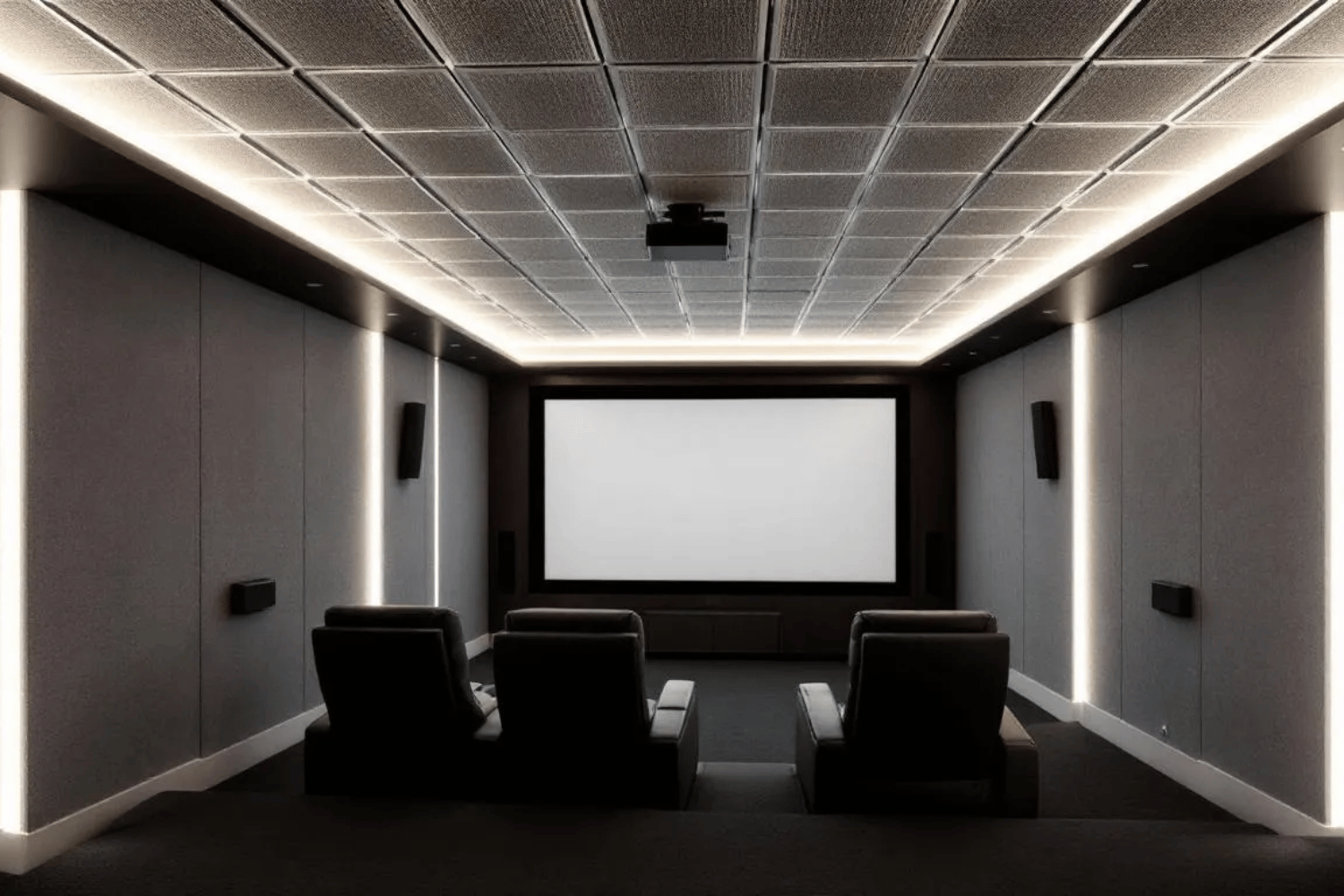 The image depicts a modern home theater featuring a sleek acoustic drop ceiling with integrated LED lighting, designed to enhance sound absorption and reduce noise transfer. The image depicts a modern home theater featuring a sleek acoustic drop ceiling with integrated LED lighting, designed to enhance sound absorption and reduce noise transfer. The ceiling tiles are part of a drop ceiling system that adds a stylish touch while ensuring easy access to overhead utilities.